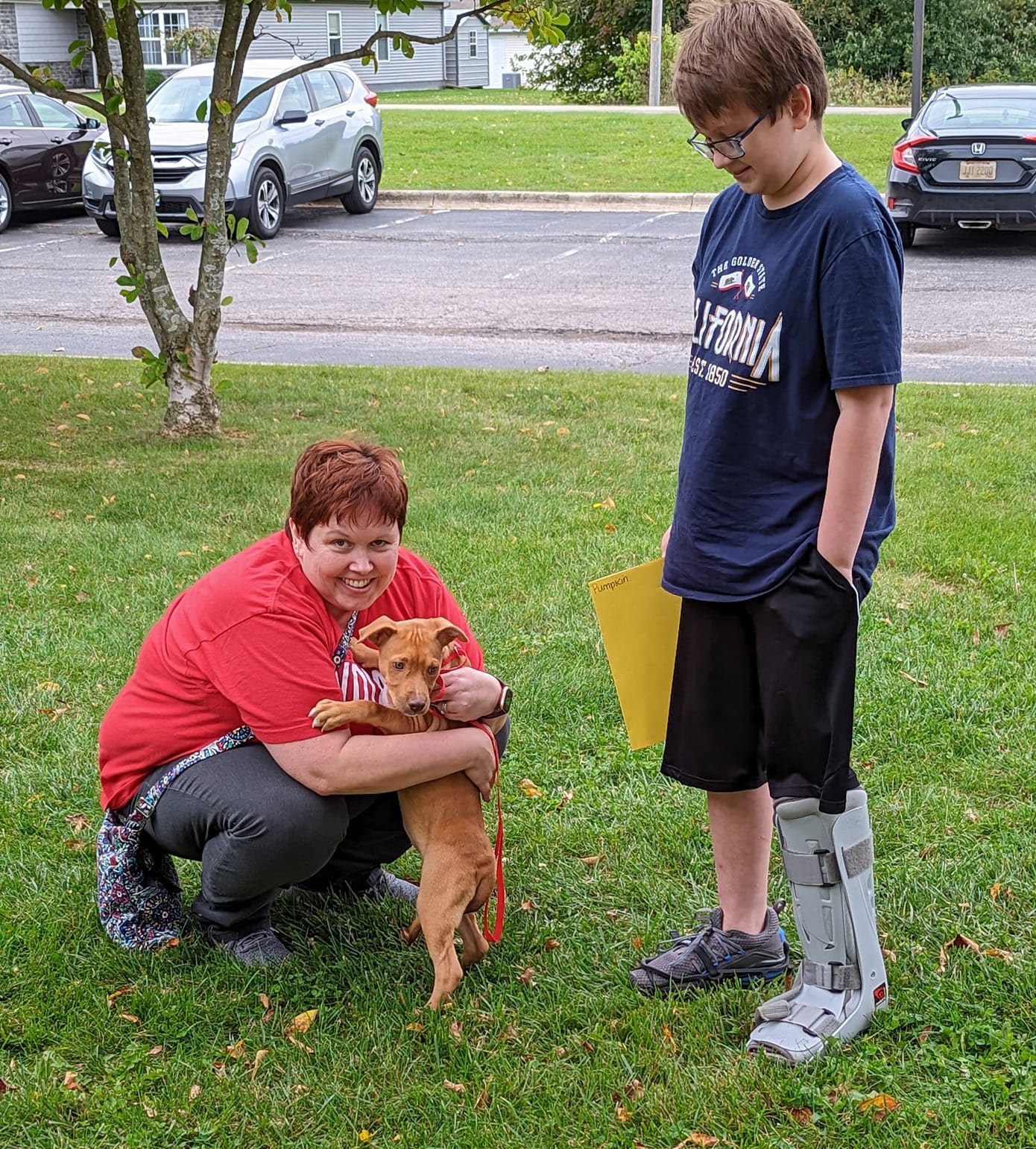 Logan and I outside the shelter where we adopted Journey!